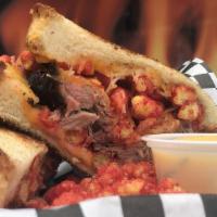 Tejano Smash O · Our carne asada grilled cheese stuffed with flaming hot cheetos.