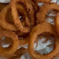 Onion Rings · A basket of onion rings fried to perfection.