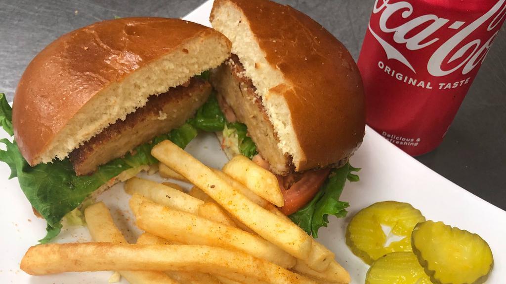 Breezeway Burger · Beef burger with grilled onion, tomato, and lettuce.