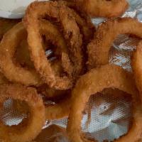 Onion Rings · A basket of onion rings fried to perfection.