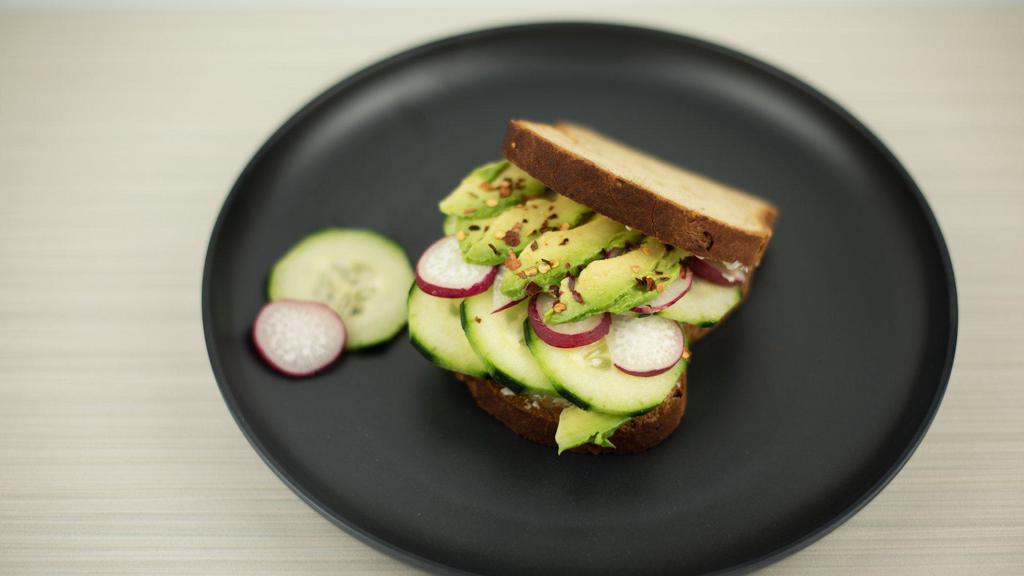 Jardīn Sandwich · Fresh avocado, cucumbers, red radish, red chile flakes & butter