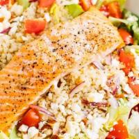 Mediteranian Salmon Salad  · PAN SEARED SALMON OVER MEDITERANIAN SALAD; ROMAIN LETUCE, CUCUMBERS, RED ONION,TOMATOES, FET...