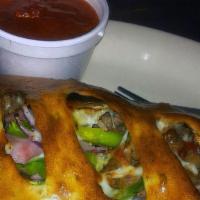 Stromboli · Pepperoni, ham, hamburger, sausage, red onions, mushrooms, bell peppers, black olives and ch...