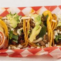 Loaded Tacos · Your choice of meat with onion, cilantro, grilled onion, cheese, avocado.