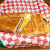 Cuban Breakfast Sandwich · Three egg breakfast sandwich with American cheese, mayo, & your choice of bacon, sausage, ha...