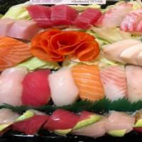 Sp11. Captain'S Special · Ten pieces of sushi, 16 pieces of sashimi and choice of a selected special roll.