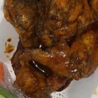 Bourbon Baked Wings (8 Wings) · Eight wings per order. Choose your choice of flavor: Lemon Bite, Ca'gave, Geechee BBQ, or NO...