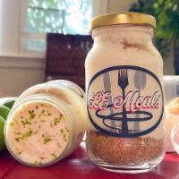 Key Lime East · A home-made, sweet Amelia Island creamy tart custard with NOLA key lime kick layered with a ...