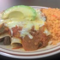 Fajita Enchiladas · Your choice of 3 chicken or beef enchiladas topped with a red ranchero sauce, melted montere...