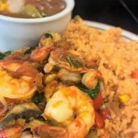 Pollo Jalisco · Grilled chicken topped with mushrooms, red bell peppers, shrimp, spinach, crawfish, and ranc...