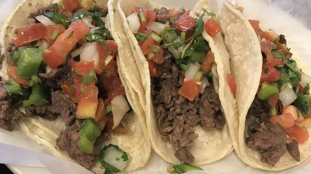 Lunch Street Tacos · 3 street tacos on corn tortillas. Served with your choice of taqueria meat, onions, cilantro rice, and beans.