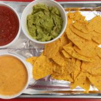 Chips & Salsa · 8 oz. bowl with choice of roasted salsa (mild) or salsa verde (hot).