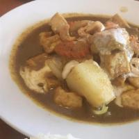 Keng Leung (Yellow Curry) · Yellow Thai curry cooked with our signature coconut sauce with carrots, onion, potatoes and ...