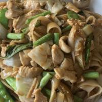 Paht Kee Mao (Drunken Noodles) · Wider rice noodles, basil, Thai chilies, onion, mushroom, green bean, snow pea, bok choy, ca...