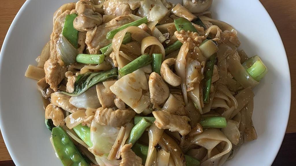 Paht Kee Mao (Drunken Noodles) · Wider rice noodles, basil, Thai chilies, onion, mushroom, green bean, snow pea, bok choy, cabbage and bell pepper