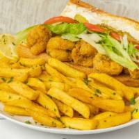Shrimp Po'Boy · Comes fully dressed with lettuce, tomatoes, pickles and mayo. Side item French fries.