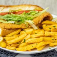Fish Po'Boy · Comes fully dressed with lettuce, tomatoes, pickles and mayo. Side items Fries and Coleslaw.