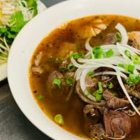 Lemongrass Beef Soup · THIS TRADITIONAL VIETNAMESE DISH IS KNOWN FOR ITS UNIQUE BALANCE OF SPICY, SALTY AND SWEET F...
