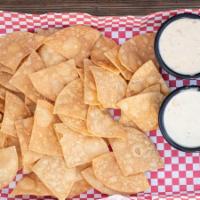 Chips & Queso · Crispy tostadas and queso blanco.
