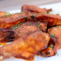  Las Wings · Eight chicken wings tossed in choice of sauce: sweet and spicy chamoy buffalo, lime and taji...