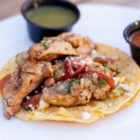Pollo Asado Taco · Grilled chicken, pico de Gallo, guacamole, chile de árbol salsa