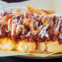 Bbq Bacon Ranch Chicken Dog W/Fries · BBQ and ranch sauce, bacon, Cheddar cheese with chicken.
