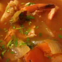Caldo Mixto / Mixed Soup · Camarón y pescado. / Shrimp and fish.