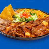 Carne Guisada Plate · Carne Guisada is back, our sauce marinates and cooks Stewed Beef with potatoes for a delicio...