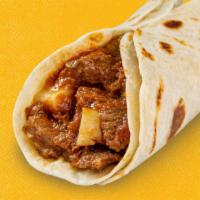 Carne Guisada Taco · Two flour tortillas cooked to perfection stuffed with Carne Guisada, our famous beef stew!