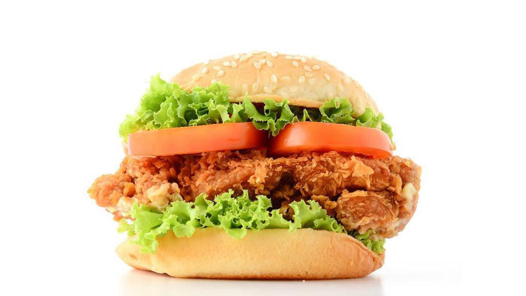 Fried Chicken Burger · One third pound beef angus, lettuce, pickles, tomato, onion.