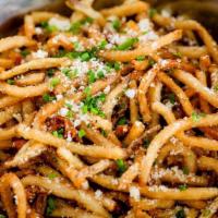 Truffle Fries (To Share) · House fries tossed with Truffle Oil, Parmesan Cheese, Chives, Salt