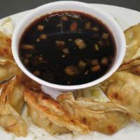 Pot Stickers (8) · Small dumpling turnovers, filled with delicate chicken stuffing. (Choose steamed, pan fried ...