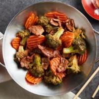 Broccoli Beef · Tender sliced beef & broccoli and carrots in brown sauce.
