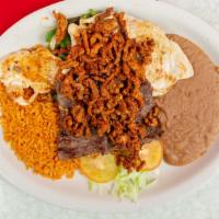 Guadalajara Plate · Beef, chicken and marinated pork with onion, bell pepper and nopales.