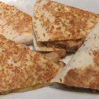 Quesadillas · Grilled flour tortilla stuffed with cheddar and mozzarella cheese, and your choice of chicke...