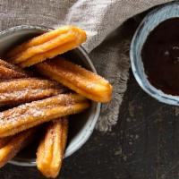 Cookies & Cream Churros (2Pc) · Made from a gluten based dough with eggs and milk, our delicious churro batter is piped fres...