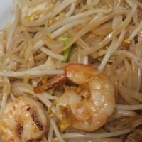 Pad Thai · Stir fried rice noodles with egg, onions, and bean sprout.