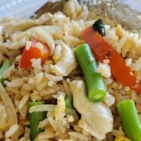 Basil Fried Rice · Stir fried rice with egg, green bean, onions, red bell pepper, garlic, and basil.