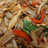 Pad Kee Mao  · Stir fried flat noodles w/ egg, red bel, garlic , onions, , green bean and fresh  basil