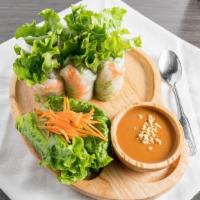Soft Spring Rolls · Vegetarian. Green leaf lettuce, carrot, kani crab, vermicelli, rice paper. Served with peanu...
