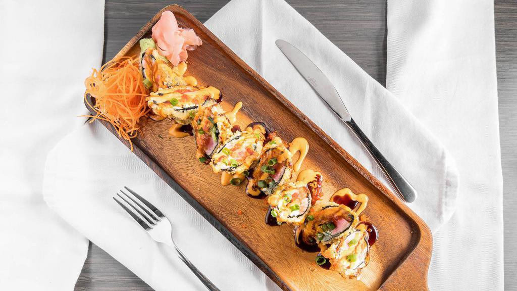 Bangkok Tower Roll · Salmon, tuna, cream cheese, green onion, jalapeno, deep fried and topped with masago, spicy mayo and eel sauce. NO sushi rice.