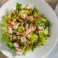 Crossfit Salad · Tossed greens, black bean corn relish, avocado slice, tomato, bacon, queso fresco, your choi...