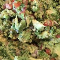 Table Guacamole · Made fresh at your table with your favorite ingredients: onion, jalapeño, pepper, tomato, ci...