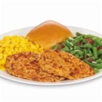 Southwest Grilled Chicken Meal · Two mildly spiced grilled chicken breasts served on a bed of southwest rice, choice of two r...
