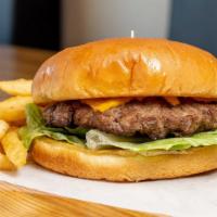 Angus Beef Classic · Angus beef patty, house sauce, pickles, leaf lettuce, Roma tomato, shaved onions, American C...