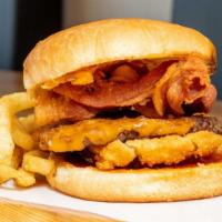 Angus Cowboy · Beef patty, BBQ sauce, onion ring, bacon, cheddar cheese.