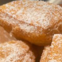 12 Beignets · Fresh French Beignets w/ powder sugar