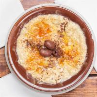 Baba Ghanouj (Eggplant Dip) One Size · Roasted eggplants mixed with garlic, tahini, lemon juice, and olive oil, served with pita br...