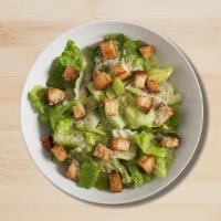 Crystal Salad · Fresh crisp romaine lettuce, tossed with Caesar's dressing and topped with Parmigiano Reggia...