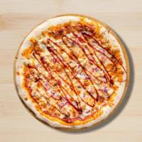 Extravaganza Bbq Pizza · Roasted chicken, bacon, red onions, cheddar and mozzarella cheese.